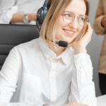 Smiling Woman Working in a Call Center